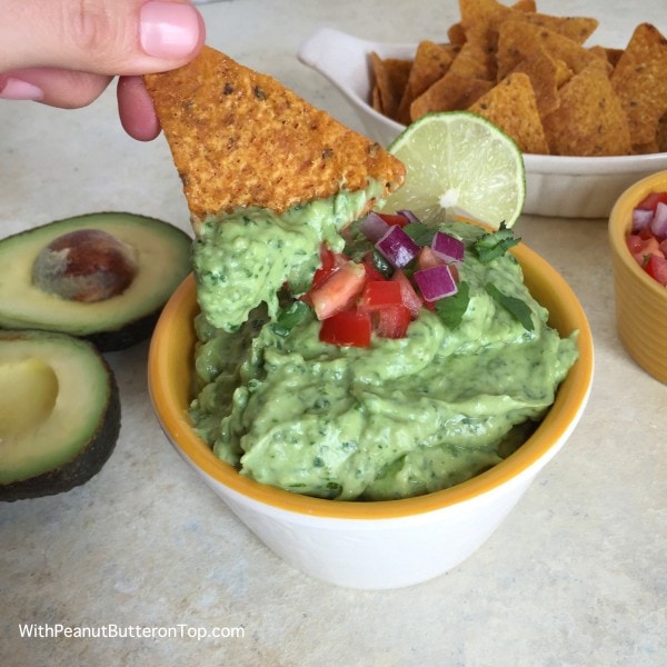 Greek Yogurt Spinach Guacamole With Peanut Butter on Top