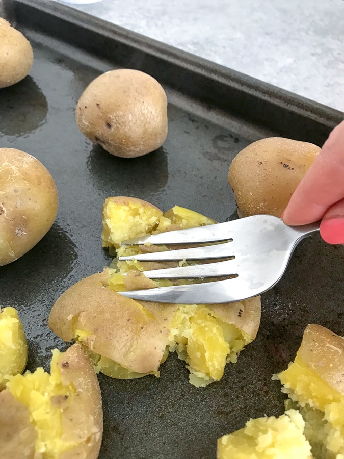 Crispy Loaded Garlic Smashed Potatoes With Peanut Butter on Top