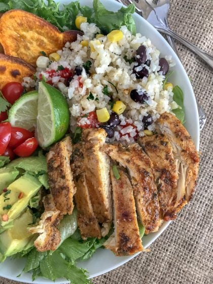 Jamaican Jerk Chicken Bowls - super simple and so much flavor packed into one bowl! These bowls have a hint of spice, but are packed full of healthy veggies and the perfect, healthy meal for any occasion! #healthy #chicken #bowls | https://withpeanutbutterontop.com