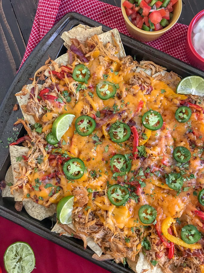 Loaded Chipotle Chicken Carnitas Nachos With Peanut Butter on Top