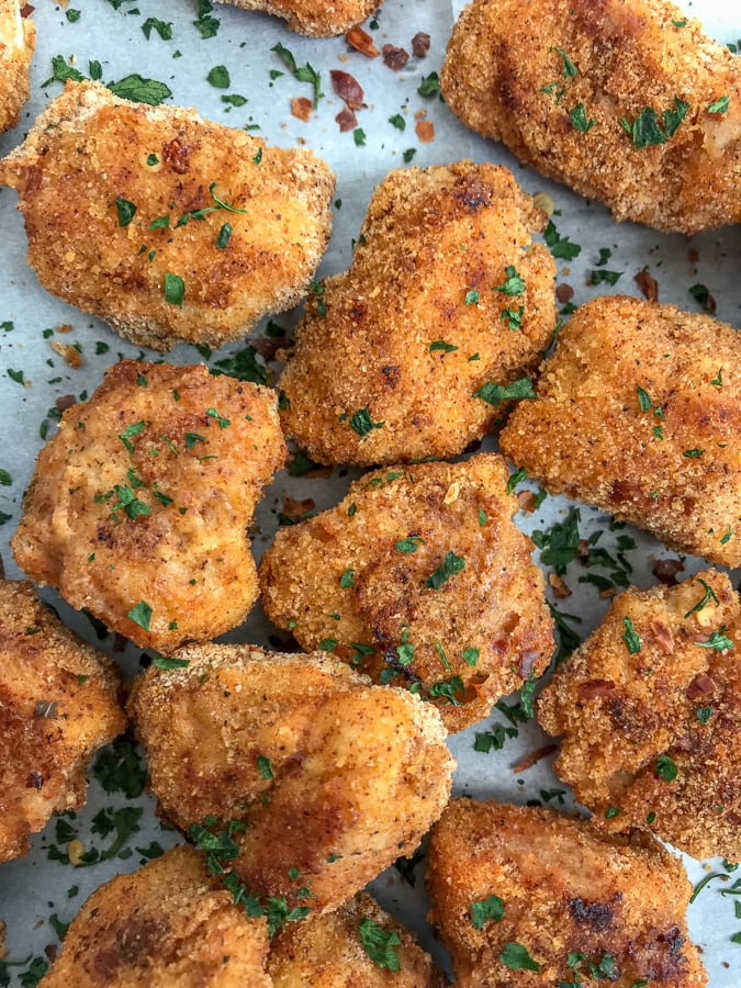 Baked Crispy Spicy Chicken Nuggets With Peanut Butter on Top