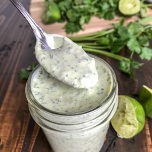 Creamy Cilantro Lime Sauce - super easy and absolutely delicious! Perfect for grilled meats and vegetables or on a salad! #sauce #dressing #cilantrolime #tacos #tacotuesday | https://withpeanutbutterontop.com