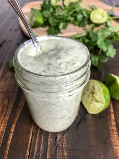 Creamy Cilantro Lime Sauce - super easy and absolutely delicious! Perfect for grilled meats and vegetables or on a salad! #sauce #dressing #cilantrolime #tacos #tacotuesday | https://withpeanutbutterontop.com