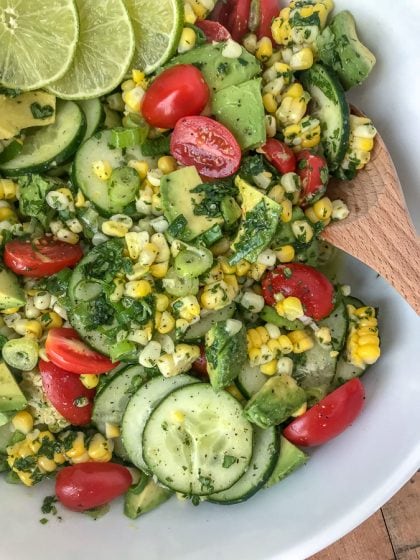 Cucumber Avocado Corn Salad - an easy to make, light and refreshing salad that is perfect as a side dish for any occasion! #salad #avocado #sidedishes #easy |https://withpeanutbutterontop.com