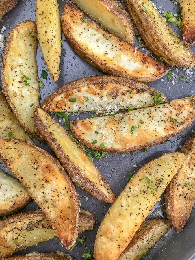 Crispy Baked Garlic Parmesan Potato Wedges With Peanut Butter on Top