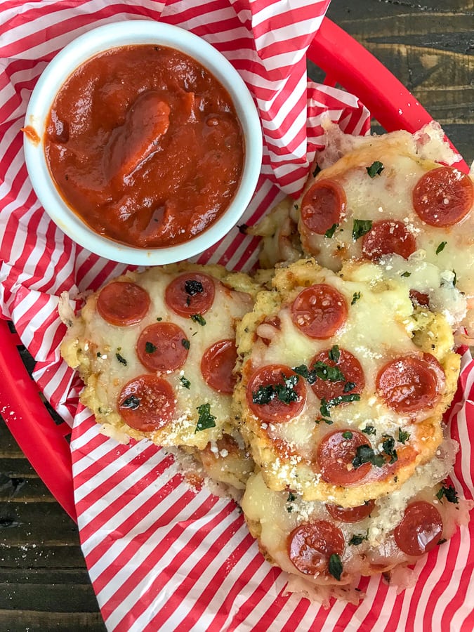 Mini Cauliflower Pepperoni Pizza's - the best, crispy cauliflower pizza you will ever try! Easy, healthier, and lower-carb! #cauliflowerpizza #cauliflower #lowcarb #healthy #pizza | https://withpeanutbutterontop.com
