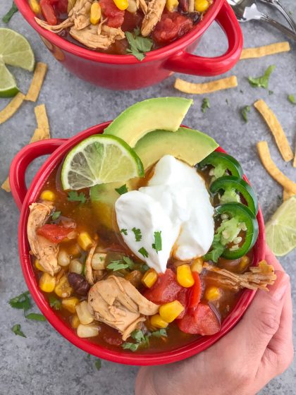 Easy Instant Pot Chicken Taco Soup - a delicious, healthy, and super easy meal to make that requires little effort and only one pot! Perfect for #mealprep and cold winter days! #tacosoup #instantpot #instantpotrecipes #tacotuesday #soup | https://withpeanutbutterontop.com