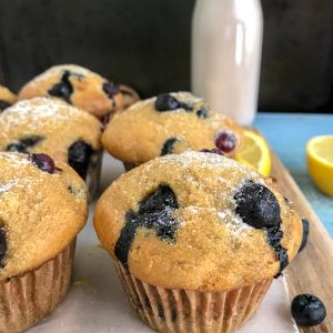 Lemon Blueberry Yogurt Muffins - the perfect, simple, and delicious muffin for breakfast or grab-n-go snacks! #lemonblueberry #muffins #breakfast #snacks | https://withpeanutbutterontop.com
