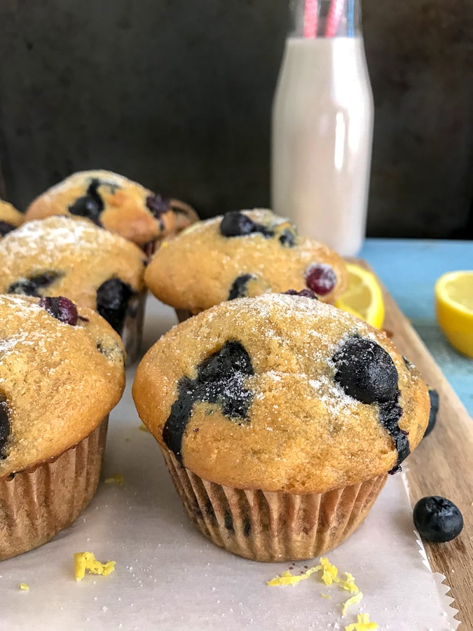 Lemon Blueberry Yogurt Muffins - the perfect, simple, and delicious muffin for breakfast or grab-n-go snacks! #lemonblueberry #muffins #breakfast #snacks | https://withpeanutbutterontop.com