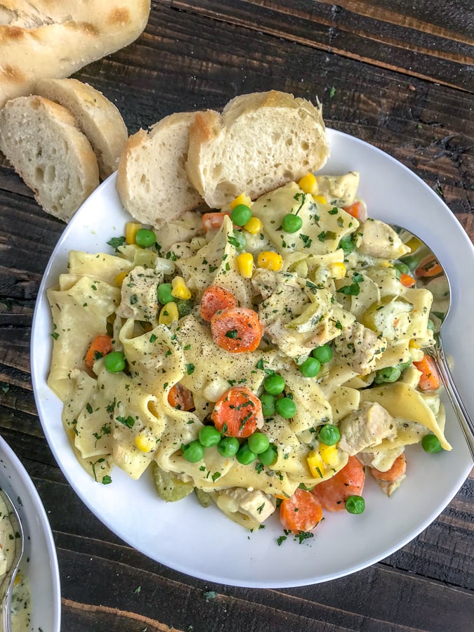 Easy One Pot Creamy Chicken and Noodles - the perfect classic comfort dish that contains delicious, creamy pasta, and is packed not just full of flavor, but vegetables as well! Guaranteed to be a family favorite! #easydinners #onepot #onepotmeals #easy #creamychickenandnoodles | https://withpeanutbutterontop.com