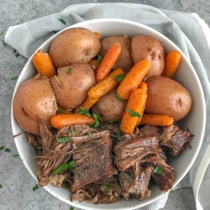 Super Tender Instant Pot Pot Roast - a classic family favorite made super simple and quick using the Instant Pot! Pot roast so tender the meat simply falls apart. #instantpot #potroast #dinner #simple | https://withpeanutbutterontop.com