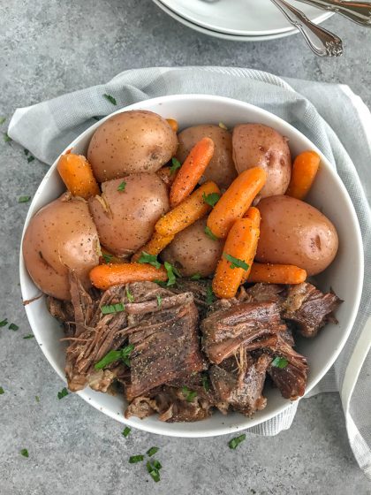 Super Tender Instant Pot Pot Roast - a classic family favorite made super simple and quick using the Instant Pot! Pot roast so tender the meat simply falls apart. #instantpot #potroast #dinner #simple | https://withpeanutbutterontop.com