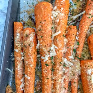 Garlic Butter Parmesan Roasted Carrots - cooked to a delicious and tender perfection. Very easy to make, flavorful, and the perfect side dish to any meal!