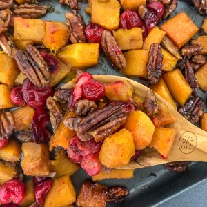 Honey Roasted Butternut Squash - a side dish that comes together so easily and with an abundance of flavor! Your taste buds will be tickled pink with this dish! Easy to make and perfect for the holiday season. #butternutsquash #thanksgiving #sidedish | https://withpeanutbutterontop.com