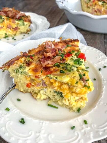 Ham and Broccoli Hash Brown Quiche - the perfect use for leftover holiday ham! Easy to make, full of vegetables and flavor, and guaranteed to wow your family and guests! Hash browns replace the traditional crust in a delicious way. #breakfast #ham #leftovers #quiche | https://withpeanutbutterontop.com