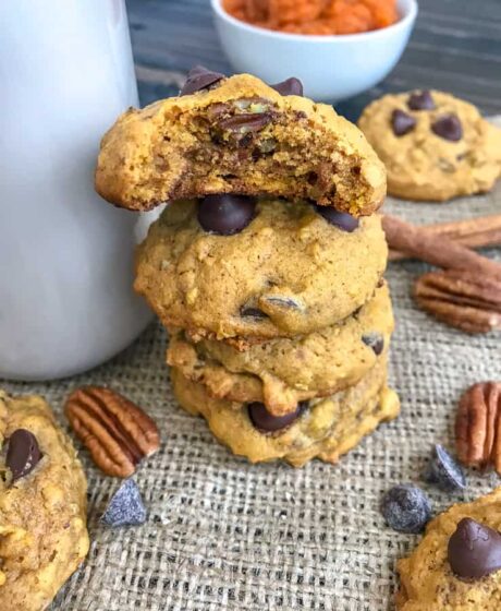 Chocolate Chip Pumpkin Pecan Cookies - soft, moist cookies with the perfect hint of pumpkin flavor, while being loaded with oats, chocolate chips, and pecans! Great for after school or on-the-go snacks! #cookies #pumpkincookies #pumpkin #chocolatechip | https://withpeanutbutterontop.com