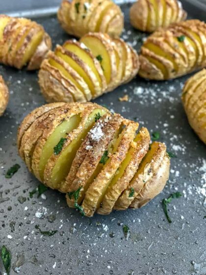 Mini Garlic Butter Parmesan Hasselback Potatoes - super easy side dish to make that is perfect for any occasion! Crispy on the outside, flaky on the inside, and incredibly delicious! #hasselback #potatoes #sidedish | https://withpeanutbutterontop.com