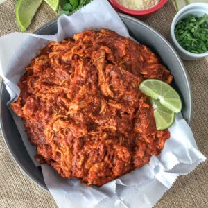 Chicken Tinga made with shredded chicken, tomato sauce, fire roasted tomatoes, and chipotle chilis in adobo. Comes together in 20 minutes, is full of bold flavor, and is great in lettuce wraps and as a #MealPrep lunch! #chickentinga #chicken #easyrecipes #healthy #lunch #dinner | https://withpeanutbutterontop.com