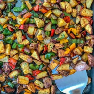 Easy Sheet Pan Breakfast Potatoes - the best and easiest way to make breakfast potatoes at home! Freezer-friendly and great for meal prepping! #breakfast #sheetpanrecipes #sheetpanmeals #sidedish #mealprep #freezerfriendly | https://withpeanutbutterontop.com