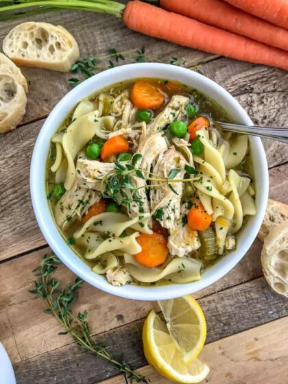 Instant Pot Chicken Noodle Soup - oh so comforting soup that is very easy to make, comes together in the Instant Pot and has a ton of flavor! This is the perfect healthy meal for a cold winter day. Loaded with tender chicken, vegetables, and noodles!