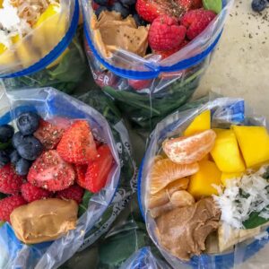 Make Ahead Freezer Smoothie Packs - homemade smoothie packs that come together easily and quickly! Perfect for meal prepping. Enjoy the convenience of a grab-n-dump smoothie straight from your freezer! #smoothies #freezersmoothiepacks #smoothiepacks #mealprep #makeahead | https://withpeanutbutterontop.com