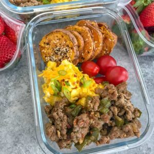 Sweet Potato Breakfast Meal Prep - a delicious, easy new meal to add to your weekly meal prep! Fluffy, cheesy eggs, ground turkey sausage and Everything Bagel sweet potato rounds. #mealprep #sweetpotatoes #breakfast #breakfastmealprep | https://withpeanutbutterontop.com