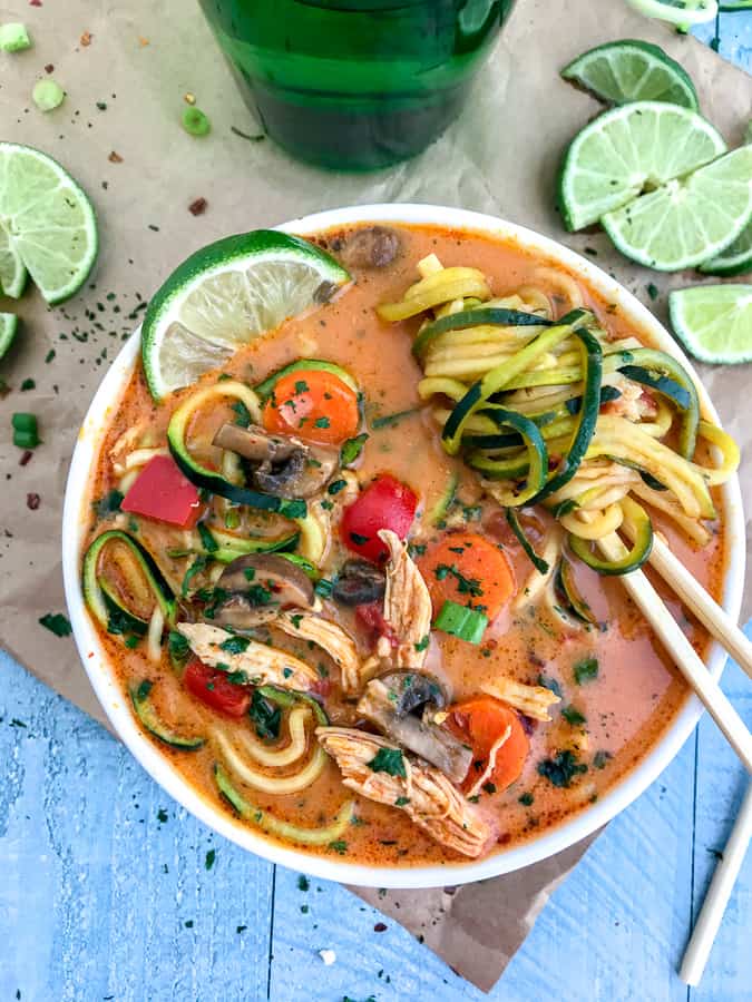 Thai Red Curry Chicken Zoodle Soup With Peanut Butter on Top