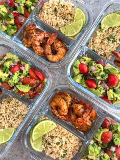 Step up your meal prep game with this super simple, healthy, and delicious Blackened Shrimp Meal Prep! Full of bold flavors and easy to put together. These are packed with blackened shrimp, cilantro lime brown rice, and an incredible avocado salsa. #mealprep #blackenedshrimp #blackenedshrimpmealprep #shrimp #healthy | https://withpeanutbutterontop.com