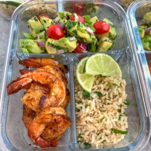 Step up your meal prep game with this super simple, healthy, and delicious Blackened Shrimp Meal Prep! Full of bold flavors and easy to put together. These are packed with blackened shrimp, cilantro lime brown rice, and an incredible avocado salsa. #mealprep #blackenedshrimp #blackenedshrimpmealprep #shrimp #healthy | https://withpeanutbutterontop.com