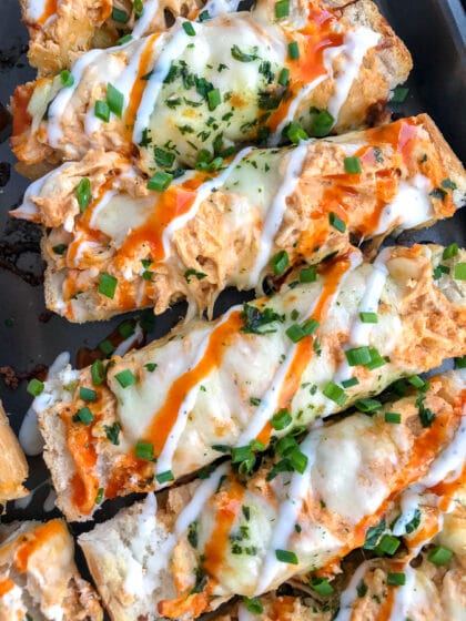 Want an appetizer for your next party or game day that will be a guaranteed crowd-pleaser? Have them begging you to make this creamy, cheesy, and incredibly indulging Buffalo Chicken Garlic Bread! #garlicbread #easyappetizers #appetizers #gameday #buffalochicken | https://withpeanutbutterontop.com