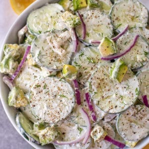 Bowl filled with Creamy Cucumber Avocado Salad.