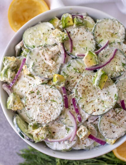 Bowl filled with Creamy Cucumber Avocado Salad.