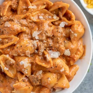 Bowl filled with creamy pasta with beef.