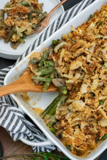 Baking dish filled with green bean casserole.